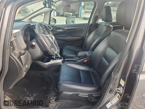 2015 Honda Fit EX-L with VIN 3HGGK5H87FM708737, listed as a Copart auction lot 64310745 with 90,446 mi miles and Salvage title. Bid and sale history available at DreamBid. Image 7.