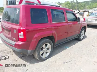 2014 Jeep Patriot Sport with VIN 1C4NJPBBXED617934, listed as a IAAI auction lot 42001839 with 117,306 mi miles. Bid and sale history available at carsss.com. Image 4.