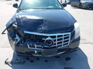2013 Cadillac CTS Luxury z VIN 1G6DE5E55D0118056, wystawiony jako IAAI lot #42085384 z przebiegiem Nie podano mil oraz . Historia ofert i sprzedaży dostępna na DreamBid. Obrazek 6.
