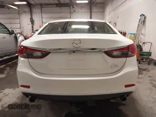 2016 Mazda Mazda6 i Sport with VIN JM1GJ1U54G1473671, listed as a IAAI auction lot 41576038 with 88,386 mi miles. Bid and sale history available at carsss.com. Image 17.