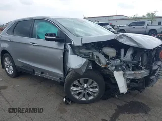 2022 Ford Edge Titanium z VIN 2FMPK4K98NBA00308, wystawiony jako IAAI lot #42169718 z przebiegiem 23 663 mil mil oraz . Historia ofert i sprzedaży dostępna na DreamBid. Obrazek 1.
