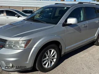 2013 Dodge Journey SXT with VIN 3C4PDDBG4DT593312, listed as a Copart auction lot 56431775 with 131,651 mi miles and Clean Title. Bid and sale history available at DreamBid. Image 2.
