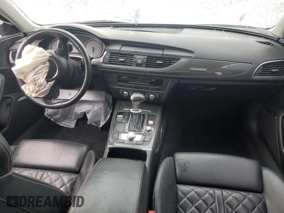 2014 Audi S6 Prestige z VIN WAUF2AFC6EN101479, wystawiony jako Copart lot #77700524 z przebiegiem 104 652 mil mil oraz Szkody całkowita. Historia ofert i sprzedaży dostępna na DreamBid. Obrazek 8.