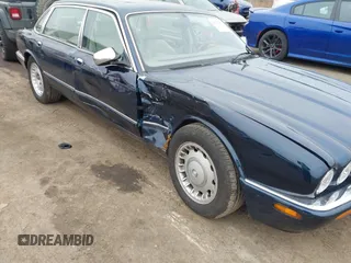 1998 Jaguar XJ Vanden Plas with VIN SAJKX6246WC832202, listed as a IAAI auction lot 41218807 with 96,589 mi miles and . Bid and sale history available at DreamBid. Image 6.