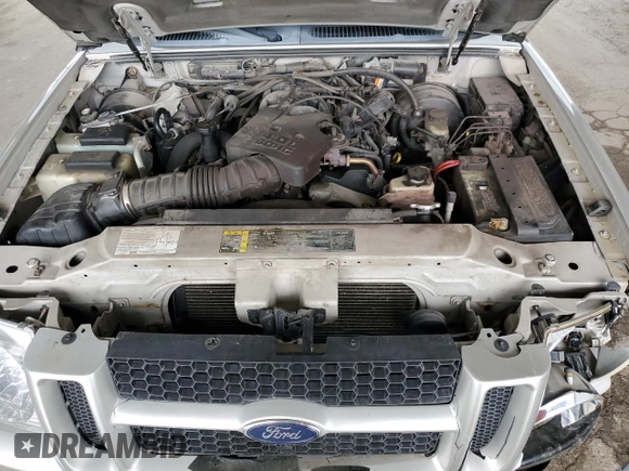 2004 Ford Explorer Sport Trac XLS с VIN 1FMZU77K14UB42380, выставлен на аукционе Copart как лот 57940305 с пробегом 201 097 миль миль и Списание • Salvage title. История ставок и продаж доступна на DreamBid. Изображение 11.