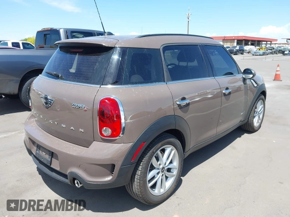 2013 MINI Countryman S ALL4 with VIN WMWZC5C54DWP34224, listed as a IAAI auction lot 42141400 with 33,307 mi miles and . Bid and sale history available at DreamBid. Image 4.
