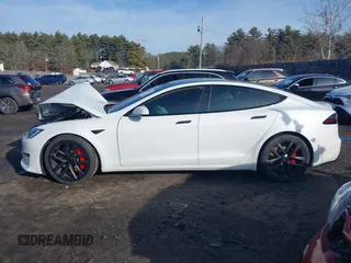 2023 Tesla Model S Plaid with VIN 5YJSA1E64PF512509, listed as a IAAI auction lot 41086678 with Not provided miles and . Bid and sale history available at DreamBid. Image 14.