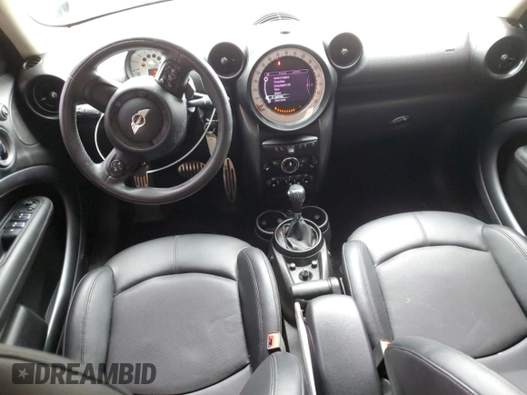 2014 MINI Countryman S with VIN WMWZC5C56EWP38065, listed as a Copart auction lot 59518395 with 91,106 mi miles and Salvage title. Bid and sale history available at DreamBid. Image 8.