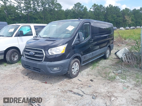 2020 Ford Transit Cargo with VIN 1FTYE1Y86LKA27345, listed as a IAAI auction lot 42577599 with 67,182 mi miles and . Bid and sale history available at DreamBid. Image 2.