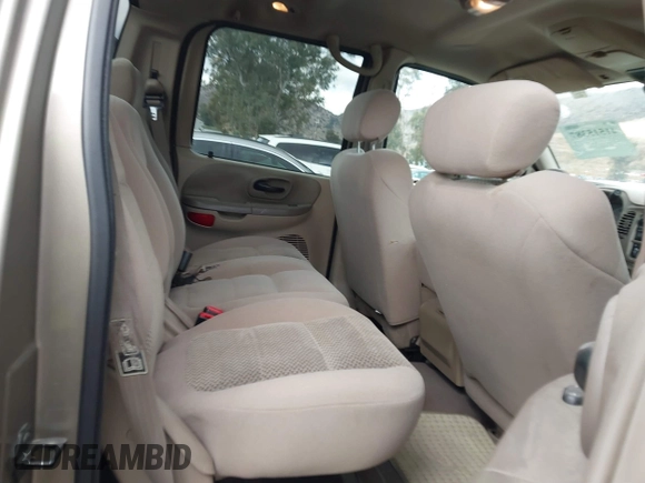 2003 Ford F-150 XLT with VIN 1FTRW07623KD34295, listed as a IAAI auction lot 41515387 with 163,506 mi miles. Bid and sale history available at carsss.com. Image 8.
