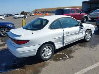 2000 Ford Escort ZX2 z VIN 3FAKP1134YR161407, wystawiony jako IAAI lot #42199401 z przebiegiem 150 611 mil mil oraz . Historia ofert i sprzedaży dostępna na DreamBid. Obrazek 4.