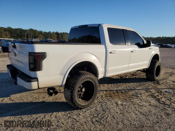 2015 Ford F-150 XLT with VIN 1FTEW1EP9FFC91698, listed as a Copart auction lot 87816535 with 127,459 mi miles and Salvage Title. Bid and sale history available at DreamBid. Image 3.