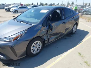 2022 Toyota Prius L Eco with VIN JTDKAMFU5N3160694, listed as a IAAI auction lot 41874909 with 80,376 mi miles. Bid and sale history available at carsss.com. Image 6.