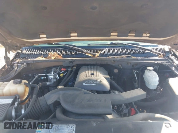 2004 Chevrolet Tahoe LT z VIN 1GNEC13Z04R130978, wystawiony jako IAAI lot #42073871 z przebiegiem 214 947 mil mil oraz . Historia ofert i sprzedaży dostępna na DreamBid. Obrazek 10.