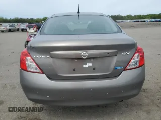 2012 Nissan Versa SV z VIN 3N1CN7AP6CL921037, wystawiony jako Copart lot #58689265 z przebiegiem 107 697 mil mil oraz Szkoda całkowita • Salvage title. Historia ofert i sprzedaży dostępna na DreamBid. Obrazek 6.