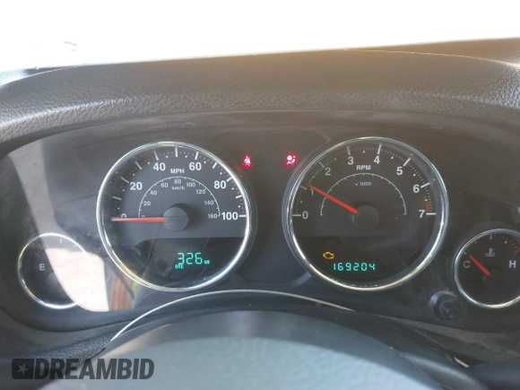 2012 Jeep Wrangler Sport with VIN 1C4AJWAG1CL286332, listed as a IAAI auction lot 42408102 with 169,204 mi miles and . Bid and sale history available at DreamBid. Image 7.