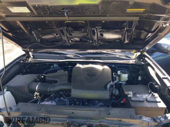 2023 Toyota Tacoma SR with VIN 3TMCZ5AN0PM614127, listed as a IAAI auction lot 41974924 with 12,674 mi miles and . Bid and sale history available at DreamBid. Image 10.