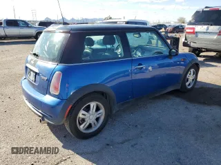 2006 MINI Hardtop z VIN WMWRC33566TJ79138, wystawiony jako Copart lot #49015335 z przebiegiem 189 928 mil mil oraz Czysty tytuł • Clean title. Historia ofert i sprzedaży dostępna na DreamBid. Obrazek 3.