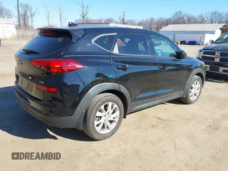 2019 Hyundai Tucson SE with VIN KM8J2CA46KU073107, listed as a IAAI auction lot 41648453 with 58,417 mi miles. Bid and sale history available at carsss.com. Image 4.