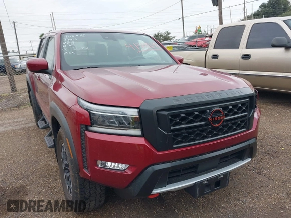 2023 Nissan Frontier Pro-4X z VIN 1N6ED1EK4PN652544, wystawiony jako IAAI lot #41309698 z przebiegiem 26 173 mil mil oraz . Historia ofert i sprzedaży dostępna na DreamBid. Obrazek 1.