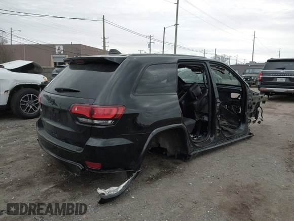 2018 Jeep Grand Cherokee Laredo E with VIN 1C4RJFAG6JC152156, listed as a IAAI auction lot 41903337 with Not provided miles and . Bid and sale history available at DreamBid. Image 4.