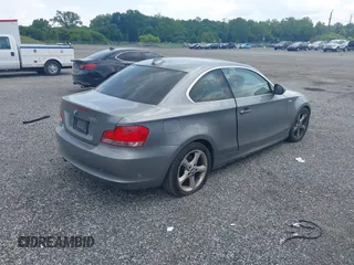 2011 BMW 1 Series 128i with VIN WBAUP9C57BVL90171, listed as a IAAI auction lot 42801051 with 150,148 mi miles and . Bid and sale history available at DreamBid. Image 4.
