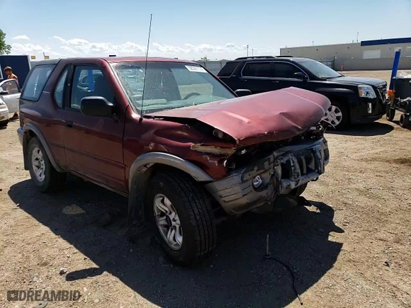 2002 Isuzu Rodeo Sport with VIN 4S2CK57W324328446, listed as a Copart auction lot 58097174 with 118,514 mi miles and Salvage Title. Bid and sale history available at carsss.com. Image 12.