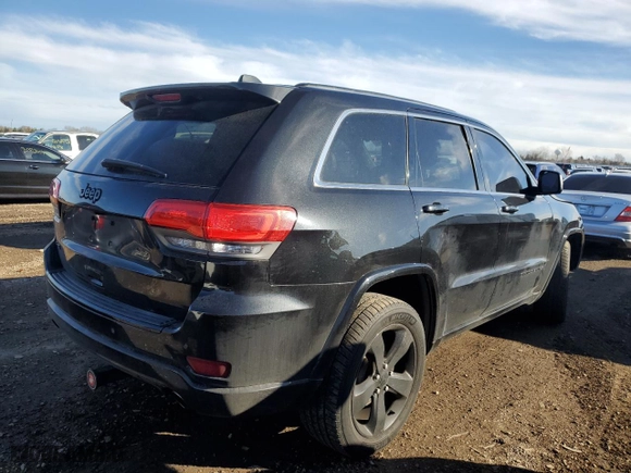 2015 Jeep Grand Cherokee Altitude with VIN 1C4RJFAG8FC767556, listed as a Copart auction lot 81266894 with 131,242 mi miles and Salvage Title. Bid and sale history available at carsss.com. Image 3.