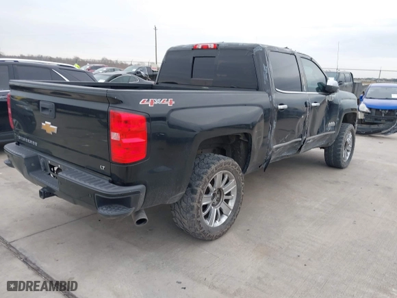2015 Chevrolet Silverado 1500 High Country with VIN 3GCUKTECXFG519223, listed as a IAAI auction lot 41323401 with 170,722 mi miles. Bid and sale history available at carsss.com. Image 4.