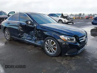 2018 Mercedes-Benz C with VIN 55SWF4JB3JU240953, listed as a IAAI auction lot 41517194 with 72,494 mi miles. Bid and sale history available at carsss.com. Image 1.