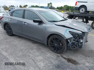 2017 Nissan Altima S z VIN 1N4AL3AP8HC216414, wystawiony jako IAAI lot #40869786 z przebiegiem 75 673 mil mil oraz . Historia ofert i sprzedaży dostępna na DreamBid. Obrazek 1.