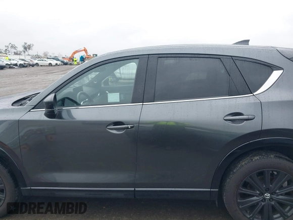 2022 Mazda CX-5 2.5 Turbo with VIN JM3KFBAY8N0647204, listed as a IAAI auction lot 41567490 with 40,396 mi miles and . Bid and sale history available at carsss.com. Image 14.