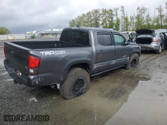 2019 Toyota Tacoma SR with VIN 3TMCZ5AN7KM237563, listed as a Copart auction lot 53919355 with 65,392 mi miles and Salvage title. Bid and sale history available at DreamBid. Image 3.