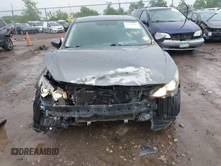2014 Mazda 3 i Touring z VIN JM1BM1L70E1212930, wystawiony jako IAAI lot #42434348 z przebiegiem 107 209 mil mil oraz . Historia ofert i sprzedaży dostępna na DreamBid. Obrazek 13.
