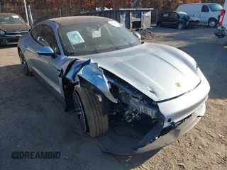 2024 Porsche Taycan with VIN WP0AA2Y13RSA13498, listed as a IAAI auction lot 40543035 with 1,618 mi miles and . Bid and sale history available at DreamBid. Image 1.
