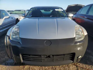 2004 Nissan 350Z Enthusiast z VIN JN1AZ36A74T015422, wystawiony jako Copart lot #77537194 z przebiegiem 147 466 mil mil oraz Nie do naprawy • Non repairable. Historia ofert i sprzedaży dostępna na DreamBid. Obrazek 5.