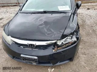 2009 Honda Civic Sdn LX with VIN 19XFA16559E020040, listed as a IAAI auction lot 41847370 with 239,239 mi miles. Bid and sale history available at carsss.com. Image 6.