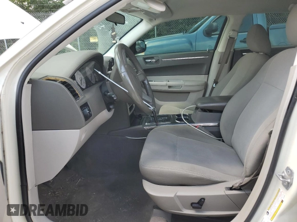 2010 Chrysler 300 Touring with VIN 2C3CA5CV3AH184687, listed as a Copart auction lot 68006024 with 122,272 mi miles and Salvage Title. Bid and sale history available at DreamBid. Image 7.