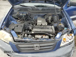 1999 Honda CR-V LX with VIN JHLRD1840XC037215, listed as a Copart auction lot 71116744 with 156,385 mi miles and Salvage Title. Bid and sale history available at carsss.com. Image 13.