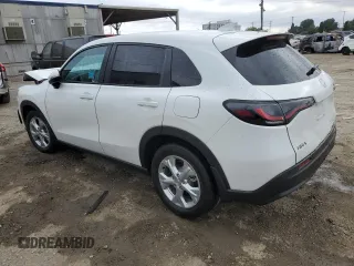 2023 Honda HR-V LX with VIN 3CZRZ1H37PM735335, listed as a Copart auction lot 58957705 with 21,203 mi miles and Salvage title. Bid and sale history available at DreamBid. Image 2.