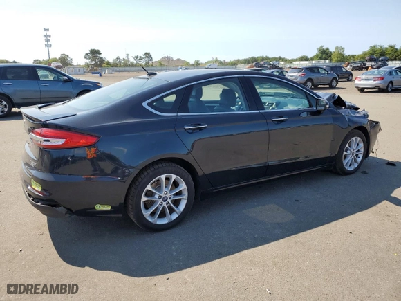 2020 Ford Fusion Plug-In Hybrid Titanium with VIN 3FA6P0SUXLR101997, listed as a Copart auction lot 69575324 with 74,121 mi miles and Salvage Title. Bid and sale history available at carsss.com. Image 3.