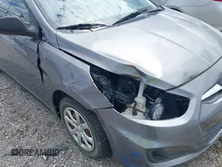 2014 Hyundai Accent GLS with VIN KMHCT4AE6EU670895, listed as a IAAI auction lot 42197066 with 142,983 mi miles and . Bid and sale history available at carsss.com. Image 6.