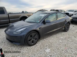 2022 Tesla Model 3 Long Range with VIN 5YJ3E1EB0NF269249, listed as a Copart auction lot 87318524 with 18,406 mi miles and Salvage Title. Bid and sale history available at DreamBid. Image 1.