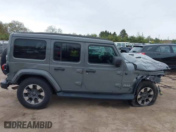 2022 Jeep Wrangler Unlimited Sahara with VIN 1C4HJXEG7NW138105, listed as a IAAI auction lot 42146898 with Not provided miles and . Bid and sale history available at DreamBid. Image 14.