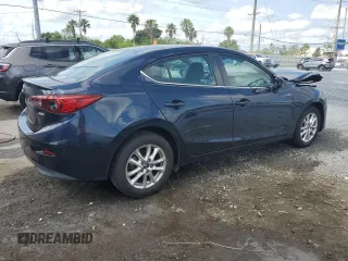 2015 Mazda 3 i Touring with VIN 3MZBM1V77FM128103, listed as a Copart auction lot 56156555 with 107,460 mi miles and Salvage Title. Bid and sale history available at DreamBid. Image 3.