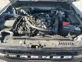 2023 Ford Bronco with VIN 1FMEE5BP0PLC06549, listed as a Copart auction lot 58703305 with 28,051 mi miles and Salvage title. Bid and sale history available at DreamBid. Image 12.