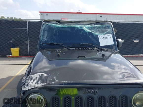 2014 Jeep Wrangler Unlimited Rubicon with VIN 1C4BJWFG0EL116026, listed as a IAAI auction lot 41729074 with 154,597 mi miles. Bid and sale history available at carsss.com. Image 6.