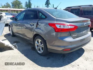 2013 Ford Focus SE z VIN 1FADP3F26DL266821, wystawiony jako IAAI lot #42677519 z przebiegiem 155 238 mil mil oraz . Historia ofert i sprzedaży dostępna na DreamBid. Obrazek 3.