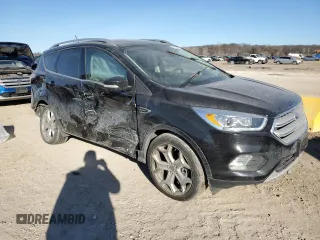 2018 Ford Escape Titanium with VIN 1FMCU9J95JUA36324, listed as a Copart auction lot 47131825 with 63,563 mi miles and Salvage title. Bid and sale history available at DreamBid. Image 4.