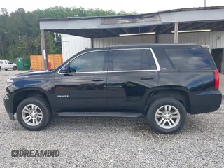 2015 Chevrolet Tahoe LS z VIN 1GNSCAKC5FR101933, wystawiony jako IAAI lot #42242415 z przebiegiem 185 191 mil mil oraz . Historia ofert i sprzedaży dostępna na DreamBid. Obrazek 14.